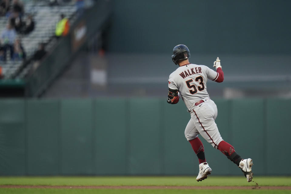 Arizona Diamondbacks' Christian Walker runs the bases after hitting a solo home run against the San Francisco Giants during the fourth inning of a baseball game in San Francisco, Tuesday, Aug. 16, 2022. (AP Photo/Godofredo A. Vásquez)