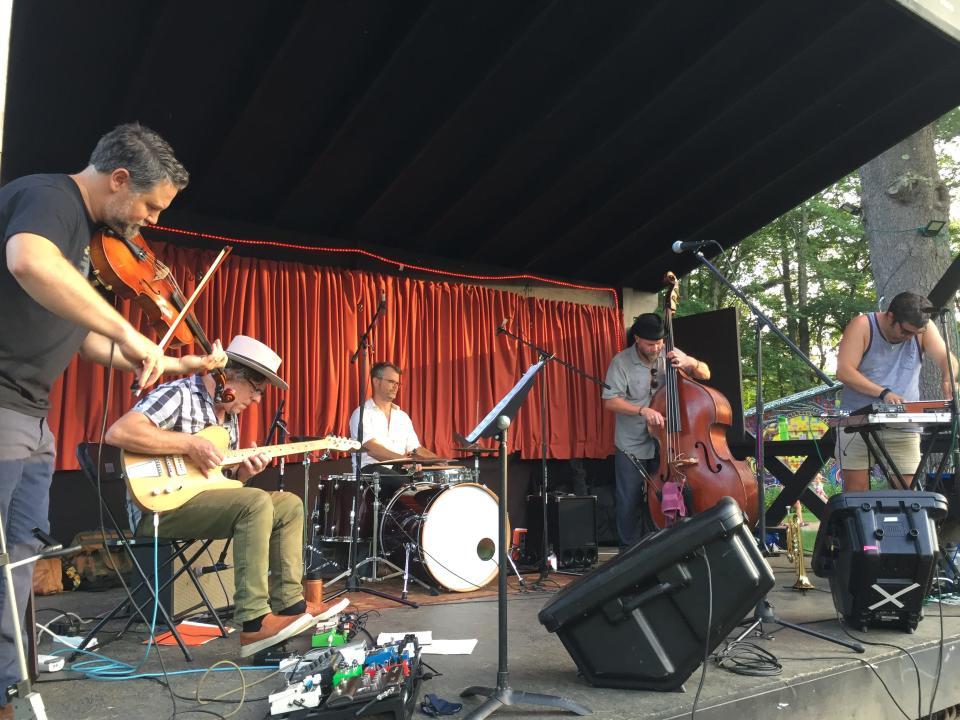 Guitarist Michael Chorney leads Freeway Clyde in a performance Aug. 13, 2021 at Camp Meade in Middlesex.