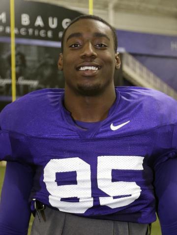 File - In this Dec. 13, 2012 file photo, TCU defensive end Devonte Fields poses for a photo at the team&#39;s training facility following a practice for the Buffalo Wild Wings Bowl in Fort Worth, Texas. Fort Worth police are investigating whether Fields pointed a gun at his former girlfriend and punched her in the head. Police said Tuesday, July 22, 2014, that no charges have been filed and Fields, the Big 12&#39;s preseason defensive player of the year, has not been arrested. (AP Photo/Tony Gutierrez, File)