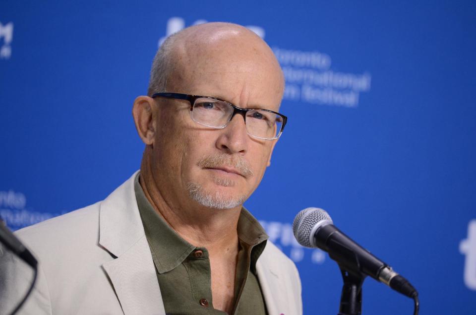 FILE - In this Sept. 9, 2013 file photo, director Alex Gibney attends the press conference for "The Armstrong Lie" on day 5 of the Toronto International Film Festival at the TIFF Bell Lightbox, in Toronto. Though Armstrong has no plans to see the film -- he sent his representatives instead, confirms Gibney -- Armstrong will get a kickback from the film’s proceeds. “When the original deal was made with Sony, Lance had a financial participation,” said Gibney. (Photo by Evan Agostini/Invision/AP, File)