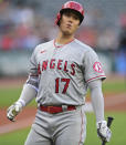 Los Angeles Angels starting pitcher Shohei Ohtani reacts after nearly being hit by a pitch during the first inning of a baseball game against the Cleveland Guardians, Monday, Sept. 12, 2022, in Cleveland. (AP Photo/David Dermer)