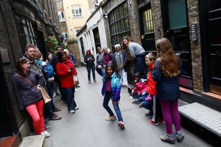 Tour Guide Greta Clarke walks with Harry Potter fans in London, Britain, April 13, 2017. REUTERS/Neil Hall