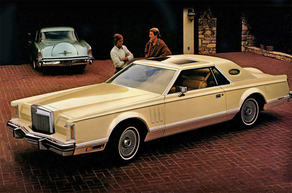 <p>Few cars exemplify excess in the manner of the Continental Mark V. Sold via Lincoln retailers, but not marketed with reference to Ford’s Cadillac rivalling marque, it’s the archetypal ‘<strong>personal luxury</strong>’ car; a razor-edged two-door coupe measuring 5850mm in length, yet its wheelbase claimed only <strong>52.31%</strong> of that. </p><p>Plenty of that real estate is up front, understandably necessary when there’s a <strong>7.5-litre V8</strong> to accommodate — that’s not a powerplant of choice if you’re concerned about the amount of unleaded you’re burning through, which is exactly what a Mark V owner would want you to think.</p><p>Particularly sought-after are the Designer Series versions of the Mark V. Colour schemes and roof finishes were particular to each of the Bill Blass, Cartier, Givenchy and Emilio Pucci examples, each featuring a 22-carat gold plaque mounted on the dashboard. Rather telling that it was one of the more restrained elements. </p>