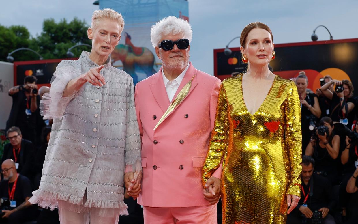 Tilda Swinton, from left, director Pedro Almodovar, and Julianne Moore at the Venice premiere