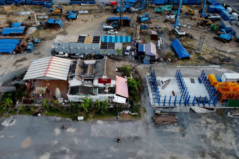 The Wider Image: In old Bangkok, a goddess resists a wave of gentrification