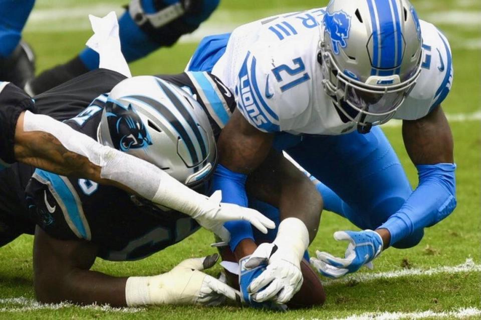 Panthers guard Dennis Daley recovers a fumble by the team during second quarter against Detroit Sunday, November 22, 2020. Daley was injured on the play and went to the teams bench.