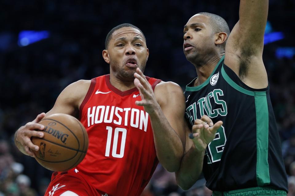 Houston Rockets' Eric Gordon (10) drives for the basket against Boston Celtics' Al Horford during the second half of an NBA basketball game in Boston, Sunday, March 3, 2019. (AP Photo/Michael Dwyer)