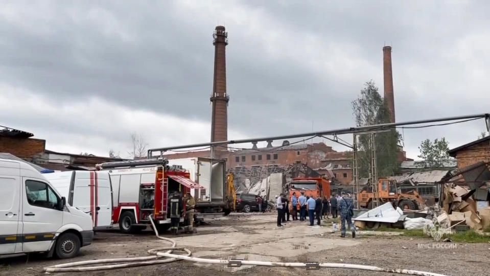In this photo released by Russian Emergency Ministry Press Service on Wednesday, Aug. 9, 2023, a view of the Zagorsk Optical and Mechanical Plant after the blast in the city of Sergiev Posad, Moscow Region, about 65 km (41miles) north-east of Moscow, Russia. An explosion Wednesday, on the grounds of a factory north of Moscow that makes optical equipment for Russia's security forces wounded dozens people, six of them severely, officials said. The blast occurred at a warehouse storing fireworks, though it was on the grounds of the Zagorsk optics manufacturing plant, according to Andrei Vorobyov, the governor of the region surrounding the Russian capital. (Russian Emergency Ministry Press Service via AP)