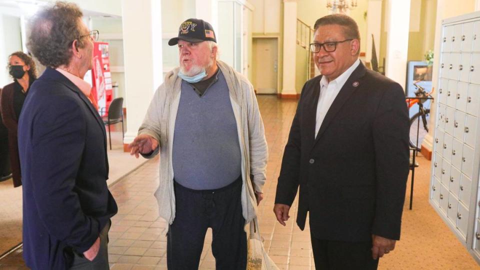 From left, HASLO executive director Scott Smith, Don Weslh, a 12-year resident of the Anderson Hotel, and Congressman Salud Carbajal, explained how securing funding for the Anderson Hotel will help preserve housing for-fixed income residents, during Carbajal’s visit on April 22, 2022. David Middlecamp/dmiddlecamp@thetribunenews.com