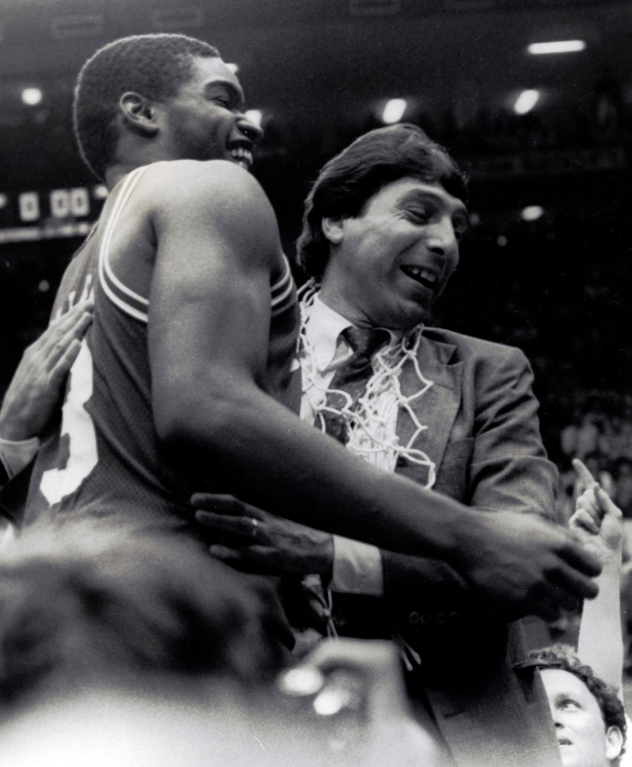 North Carolina State coach Jim Valvano celebrated with Lorenzo Charles in 1983 after the Wolfpack won the national championship with a shocking 54-52 victory over Houston. Charles made the game-winning dunk.