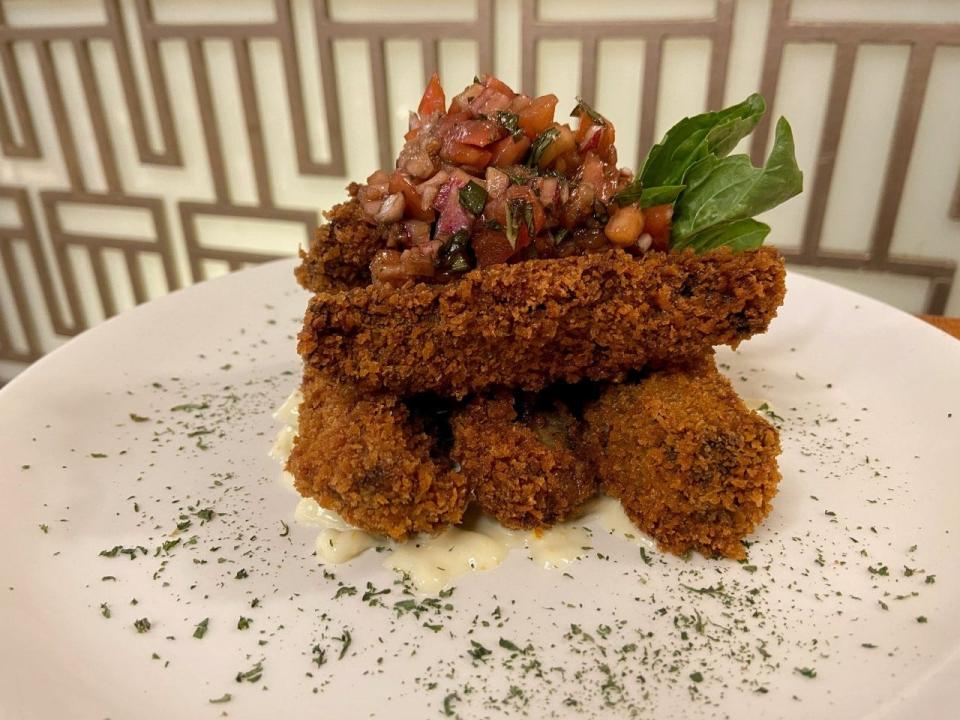 These are the Portobello fritters from The Ambassador Hotel's Gin Rickey restaurant and bar.