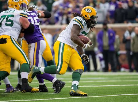 Nov 23, 2014; Minneapolis, MN, USA; Green Bay Packers running back Eddie Lacy (27) carries the ball during the fourth quarter against the Minnesota Vikings at TCF Bank Stadium. The Packers defeated the Vikings 24-21. Mandatory Credit: Brace Hemmelgarn-USA TODAY Sports