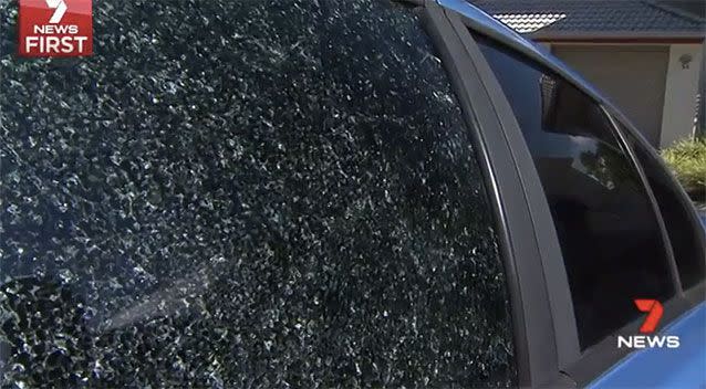 Part of brick hurled at a family car in Queensland. Source: 7 News.