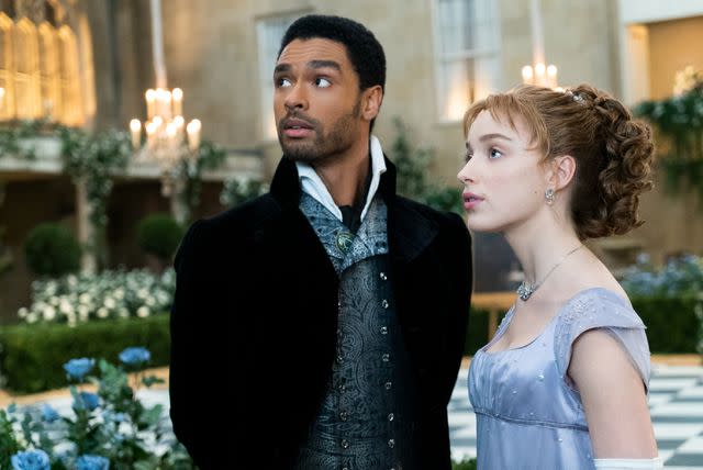 <p>Liam Daniel / Netflix</p> Regé-Jean Page as Simon and Phoebe Dynevor as Daphne in Bridgerton