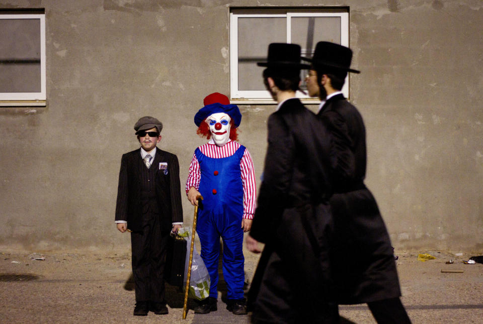 Ultra-Orthodox Jewish boys dressed for Purim pose for a photograph during celebration of the Purim festival in Bnei Brak, near Tel Aviv, Israel. The Jewish holiday of Purim celebrates the Jews' salvation from genocide in ancient Persia, as recounted in the Scroll of Esther. Photo: AP