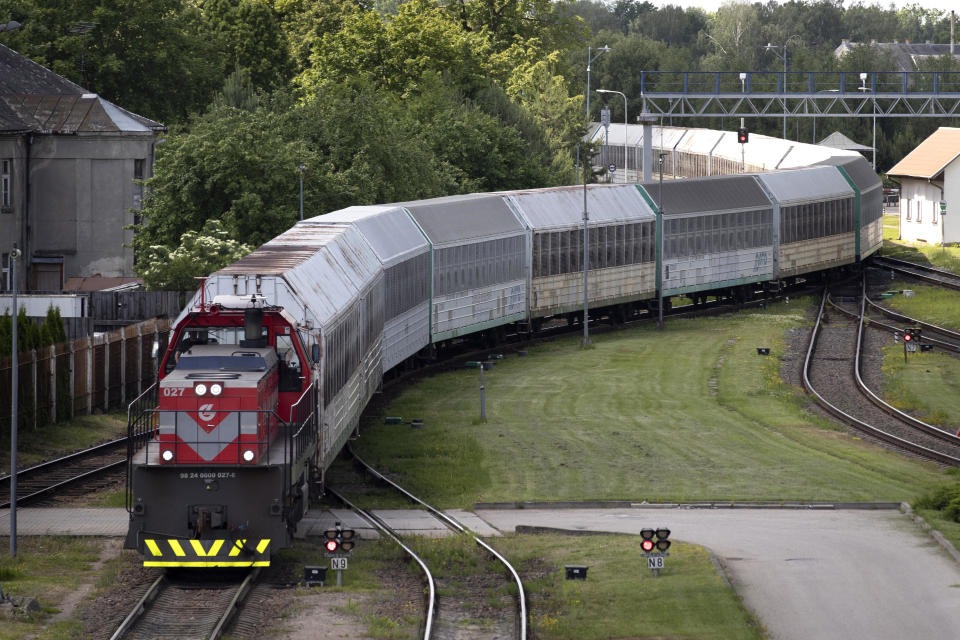 A cargo train from the Russian enclave of Kaliningrad moves to the border railway station in Kybartai, about 124 miles west of Lithuania's capital Vilnius, June 22, 2022. Lithuania has defended its decision to bar rail transit from Russia to its Baltic Sea exclave of goods under European Union sanctions. / Credit: Mindaugas Kulbis/AP