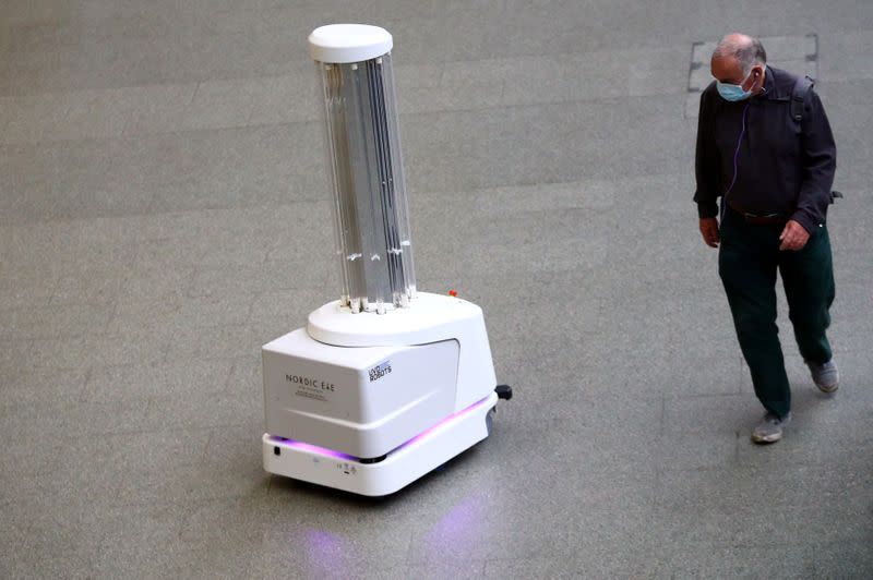 An ultraviolet (UV) robot designed to significantly reduce the risk of hospital acquired infections cleans St Pancras International station in London