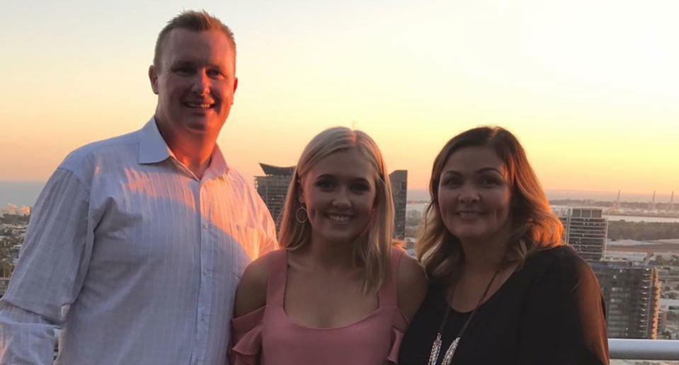 Father Peter Coll with daughter Claudia and wife Kate. Source: Supplied