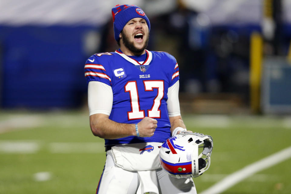 Buffalo Bills quarterback Josh Allen (17) celebrates after an NFL divisional round football game against the Baltimore Ravens Saturday, Jan. 16, 2021, in Orchard Park, N.Y. The Bills won 17-3. (AP Photo/Jeffrey T. Barnes)