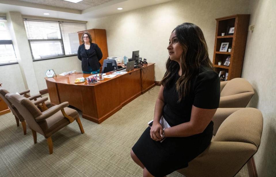 Executive director of Methodist Justice Ministries Erin Lamb, left, and development director Yajaera Chatterson, right, speaks about their time with MJM on Wednesday, June 5, at the First United Methodist Church in Fort Worth. 