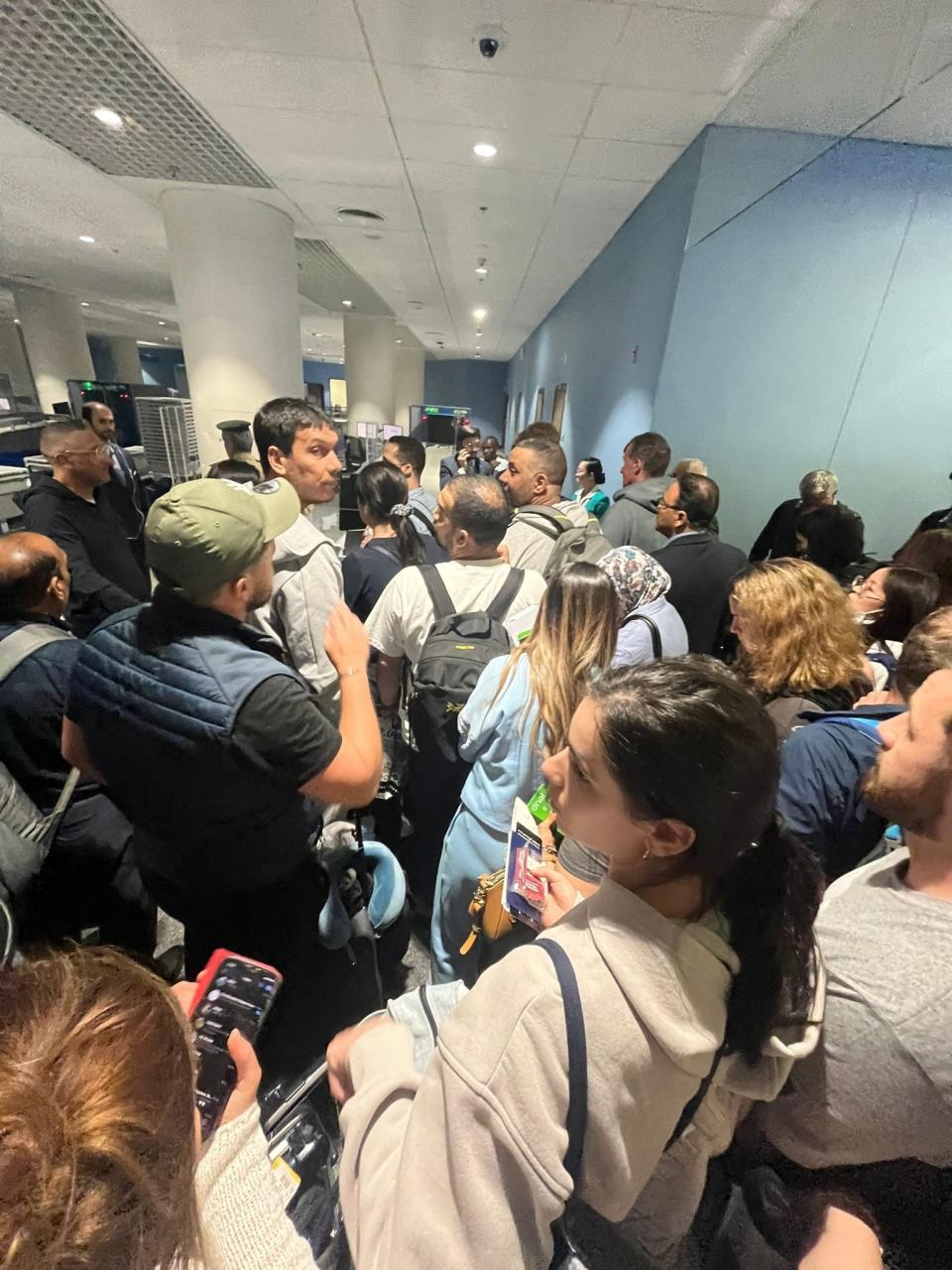 People waiting at Dubai World Central airport because of flooding