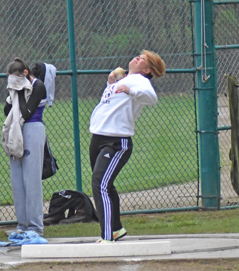 Quincy's Raigan Horsfall, shown here in early season action, qualified for the MHSAA State Finals in both the shot put and discus