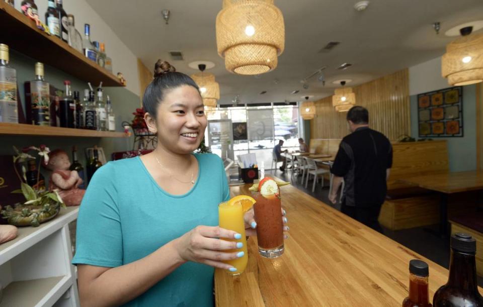 In this July 18, 2018, Telegraph file photo, Jiin Sarrtsud serves up a mimosa and a bloody Mary at Ladda Bistro on Cherry Street where she said the prospect of being allowed to serve alcohol a little earlier on Sunday would suit many of her clientele. Some Middle Georgia residents voted on the referendum for the Nov. 6 election.