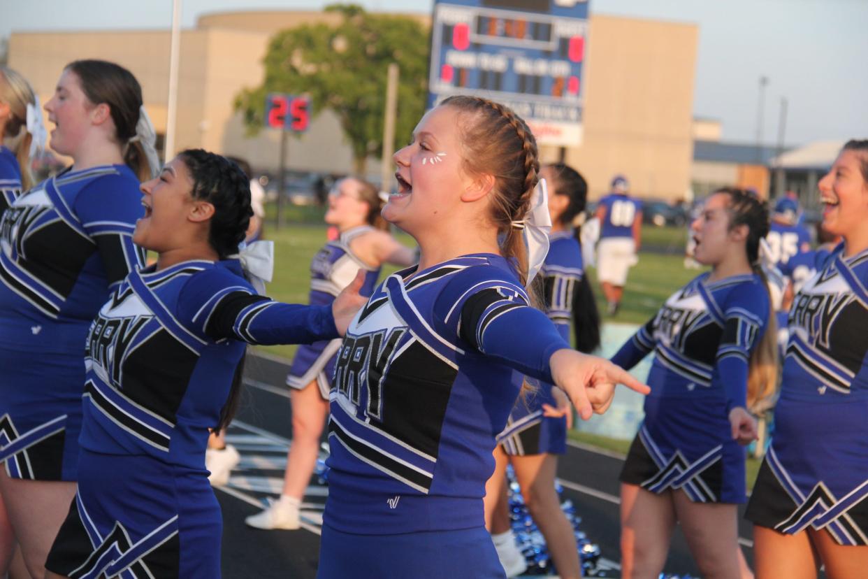 Perry cheerleaders lead the crowd in a cheer during the Fall Kickoff on Friday, Aug. 18, 2023.