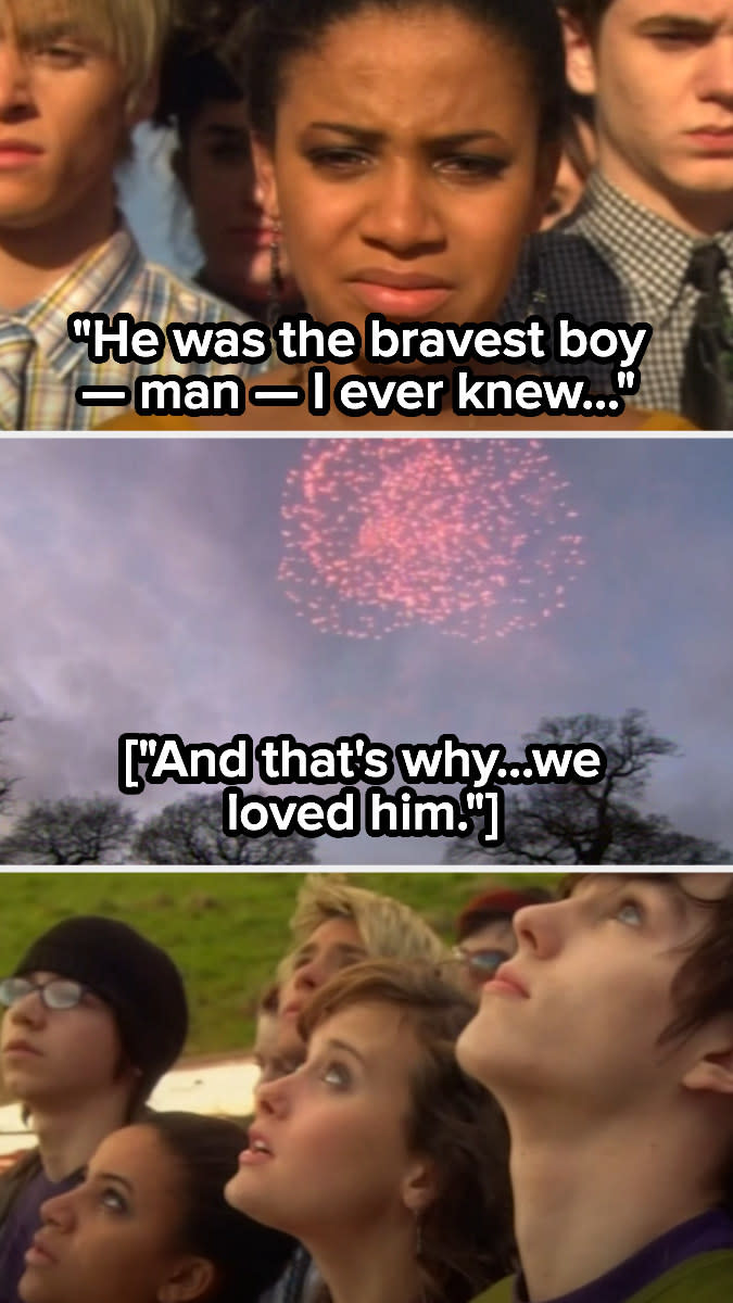 group of people looking up at fireworks