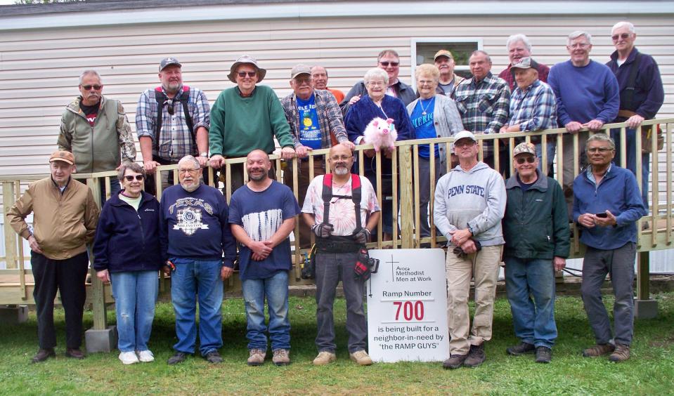 "The Ramp Guys" after concluding their 700th ramp in Avoca. Front row, left to right, Dale English, Linda Davis, Glenn Davis, Joseph Lawrence, Jr, Michael Wasserman, Henry Gottschall, Dale Landon, Matt Garrison. Back row, left to right: Larry Clark, Adam Ormsby, Frederick Wood, James Deats, Lanny Partridge, Louise Cagle, Pastor Barre Butts, Nancy Moir, James Young, Robert Kenville, John McLaughlin, Allen Belanger, Thomas Simms, Robert Edwards.