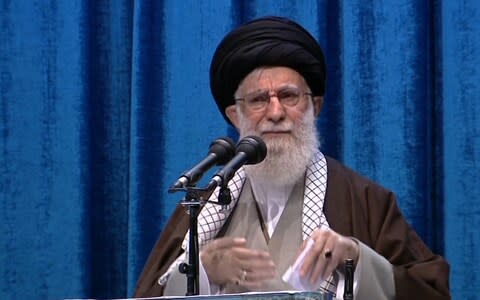 Supreme Leader Ayatollah Ali Khamenei leading the main weekly Muslim prayers in Tehran. - Credit: AFP