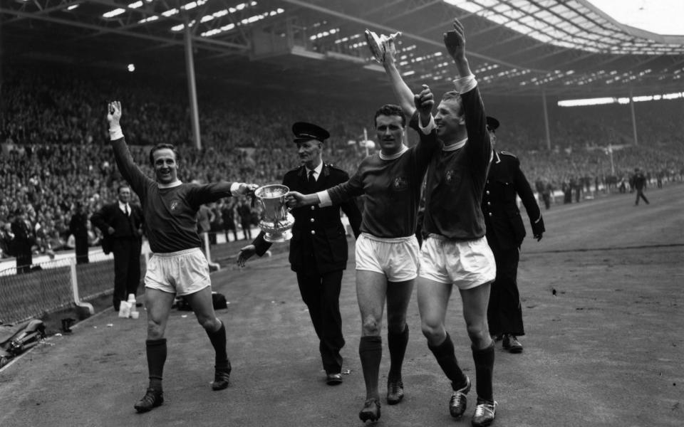 Setters, left, at Wembley with Noel Cantwell and Pat Crerand after United's FA Cup final victory in 1963 - Dennis Oulds/Central Press/Getty Images