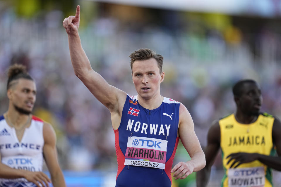 Karsten Warholm, of Norway,reacts after winning a semifinal in the mens 400-meter hurdles at the World Athletics Championships on Sunday, July 17, 2022, in Eugene, Ore. (AP Photo/Ashley Landis)