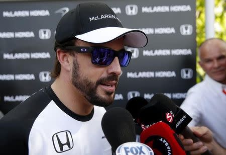 Formula One - F1 - Malaysian Grand Prix 2015 - Sepang International Circuit, Kuala Lumpur, Malaysia - 27/3/15 McLaren's Fernando Alonso speaks to the press after practice Reuters / Olivia Harris