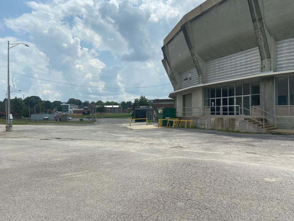 The north edge of Oman Arena is shown with construction work at Jackson Central-Merry High School across North Royal Street going on in the background.