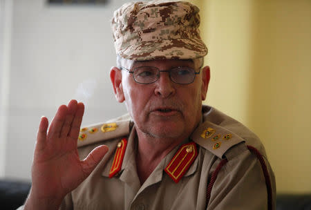 Brigadier General Mohamed al-Gasri, spokesman for a newly formed military operations room in Misrata, gestures as he speaks during an interview with Reuters in Misrata, Libya May 10, 2016. REUTERS/Ismail Zitouny