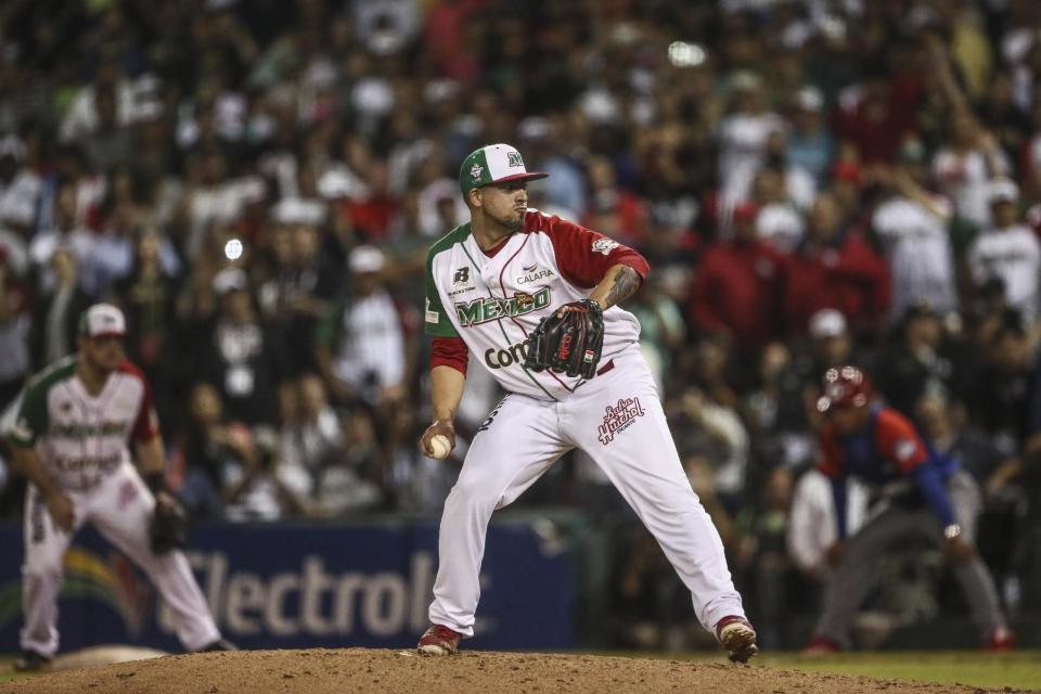 Mexico's Aguilas de Mexicali Jake Sanchez prepare to throws the ball during the Caribbean Series game against Cuba's Granma in Culiacan, Mexico, Monday, Feb. 6, 2017. Mexico held off Cuba 1-0 on Monday to reach the Caribbean Series championship game where they will face Puerto Rico. (AP Photo/Luis Gutierrez)