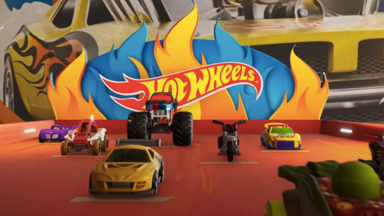  Several Hot Wheels sitting in the starting lineup of Hot Wheels Unleashed 2 - Turbocharged. 