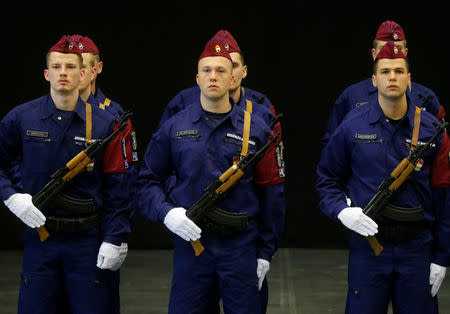 Hungarian policemen stand during a swearing in ceremony of border hunter recruits in Budapest, Hungary, March 7, 2017. REUTERS/Laszlo Balogh