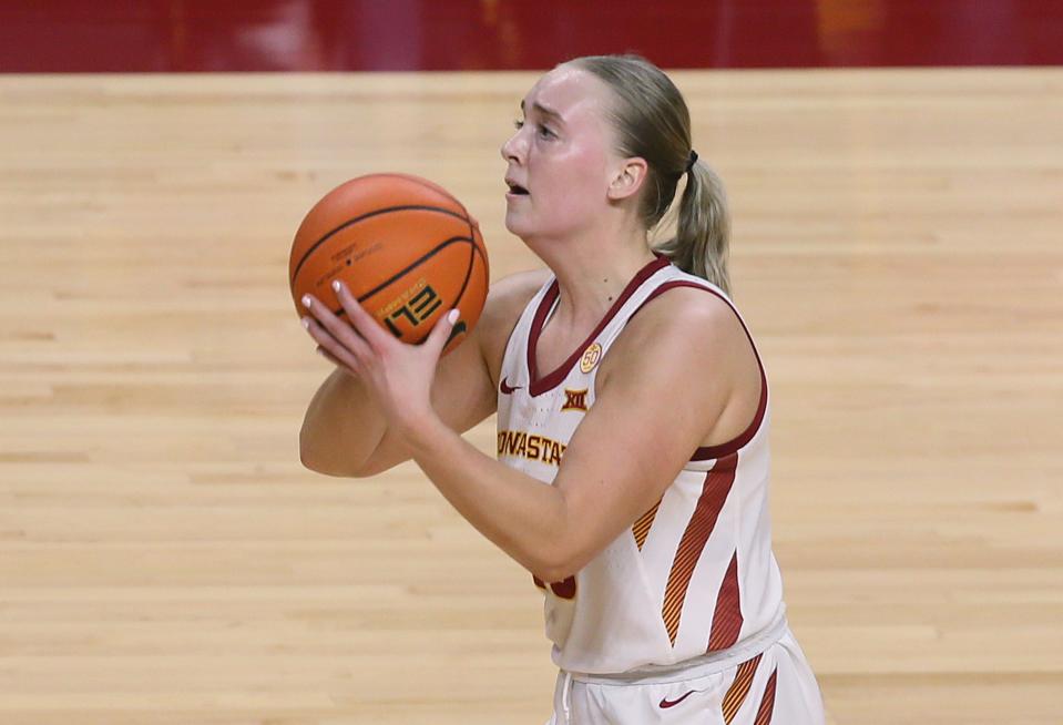 Iowa State's Hannah Belanger takes a three-point shot against Oklahoma State on Jan. 31 in Ames.