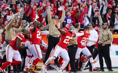 The Kansas City Chiefs bench celebrates after kicking a game winning field goal against the Minnesota Vikings at Arrowhead Stadium - Credit: USA Today