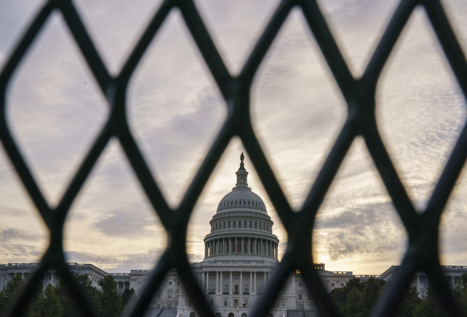 Security fencing has been reinstalled around the Capitol in Washington, Thursday, Sept. 16, 2021, ahead of a planned Sept. 18 rally by far-right supporters of former President Donald Trump who are demanding the release of rioters arrested in connection with the 6 January insurrection. (AP Photo/J. Scott Applewhite)