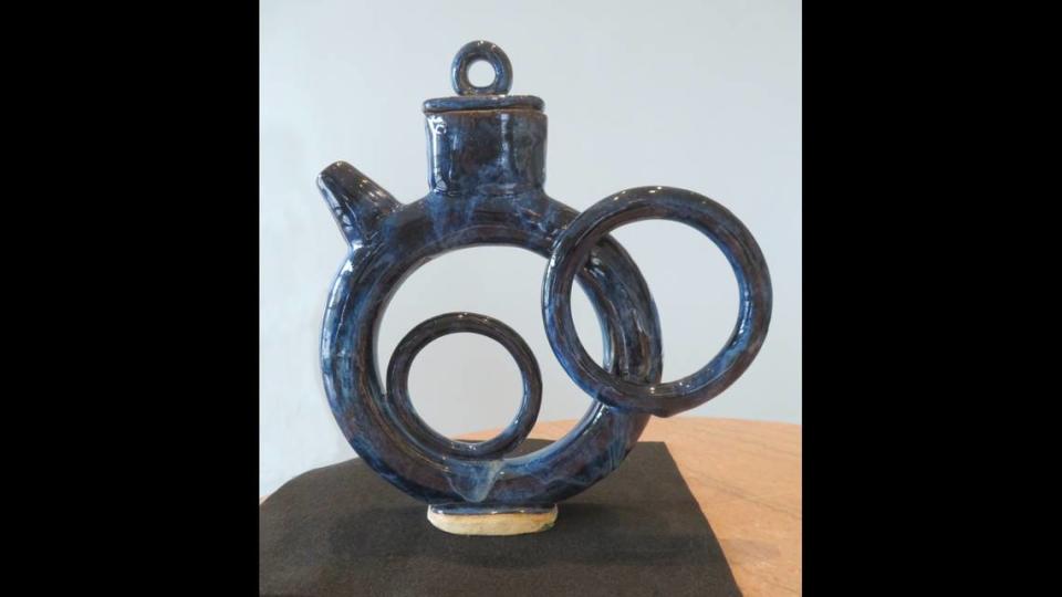 Andrew Lyke of Althoff Catholic High School won an Award of Merit, an Artist’s Choice Award, the St. Clair County Award and the Jeanne Aguirre Touch of Whimsy Award for the ceramic artwork “Teapot” at Belleville’s 2023 fine arts show Art on the Square.