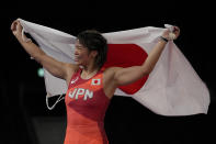 Japan's Risako Kawai celebrates after winning the gold medal defeating Belarus's Iryna Kurachkina during the women's 57kg Freestyle wrestling final match, at the 2020 Summer Olympics, Thursday, Aug. 5, 2021, in Tokyo, Japan. (AP Photo/Aaron Favila)