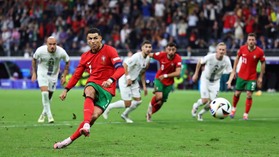 Ronaldo takes his penalty during extra-time which was saved by Jan Oblak of Slovenia. - Robbie Jay Barratt/AMA/Getty Images