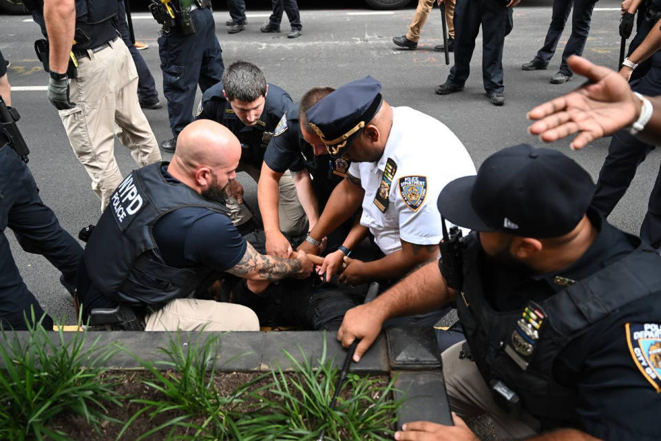 NEW YORK, UNITED STATES - AUGUST 05: New York Police Department (NYPD) team take popular YouTube and Twitch broadcaster Kai Cenat and some attendees into custody as police intervene attendees of the gift distribution event held by phenomenon YouTube and Twitch broadcaster Cenat at the Union Square in Manhattan, New York, United States on August 05, 2023. NYPD team banned entry to the area in order to calm the outrage and disperse the crowd after brawl broke out among hundreds of young people filling Union Square following popular broadcaster Cenat announced that he would distribute some free gifts to his fans through a raffle. Some young people and Twitch broadcaster Cenat, who did not obey to the warning of the police, were detained.