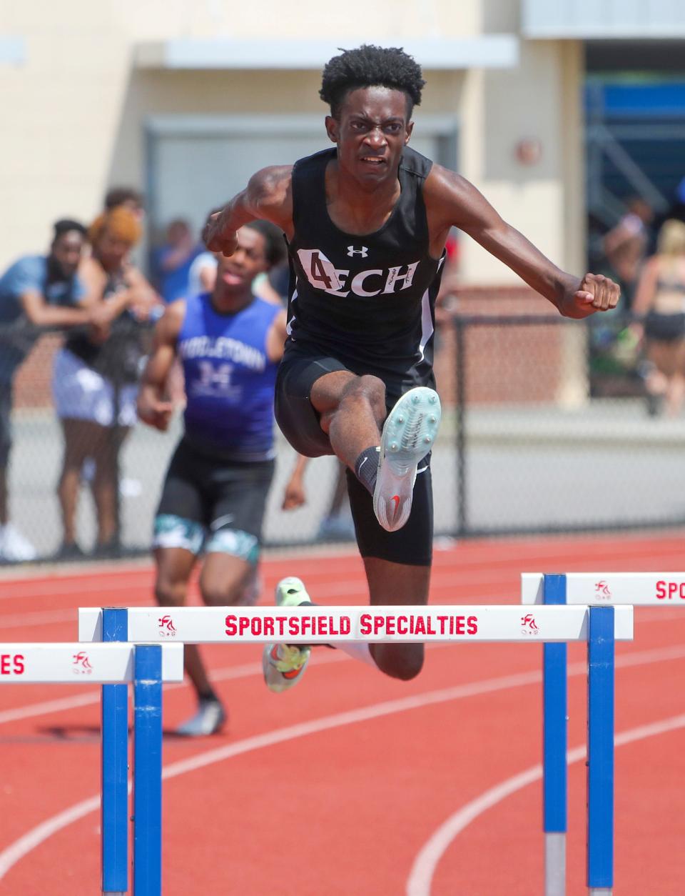 Yougendy Mauricette of Sussex Tech takes an early lead in his win in the Division I 300-meter hurdles during the DIAA Division I track and field championships on May 21 at Dover High School. Mauricette is Delaware's Boys Track Athlete of the Year and heads the All-State team.