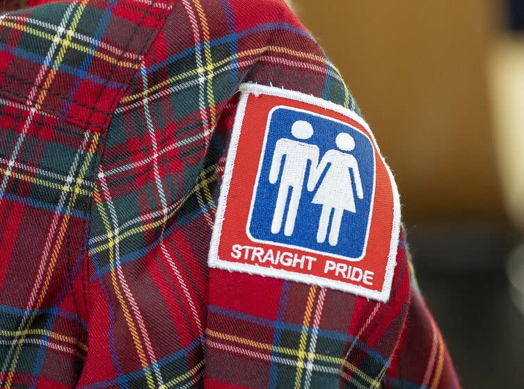 A "Straight Pride" patch is seen on a supporter's shirt during a rally with Republican nominee for governor of Arizona Kari Lake at Dream City Church in Phoenix, Arizona, on November 7, 2022 on the eve of the US midterm elections. (Photo by Olivier TOURON / AFP) (Photo by OLIVIER TOURON/AFP via Getty Images)