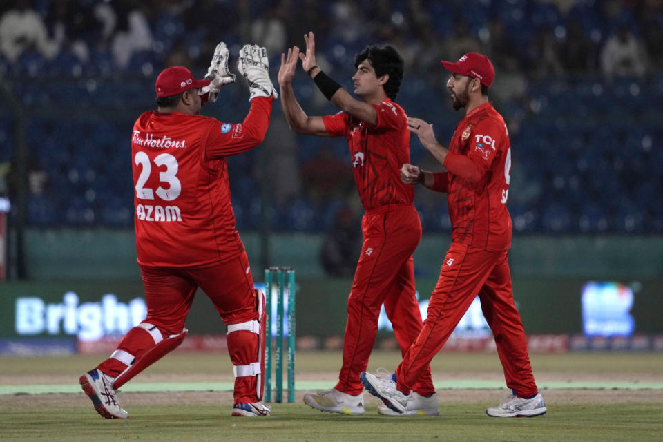 Islamabad United' Naseem Shah, center, celebrates with teammates after taking wicket during the Pakistan Super League T20 cricket eliminator match between Islamabad United and Quetta Gladiators, in Karachi, Pakistan, Friday, March 15, 2024. (AP Photo/Fareed Khan)