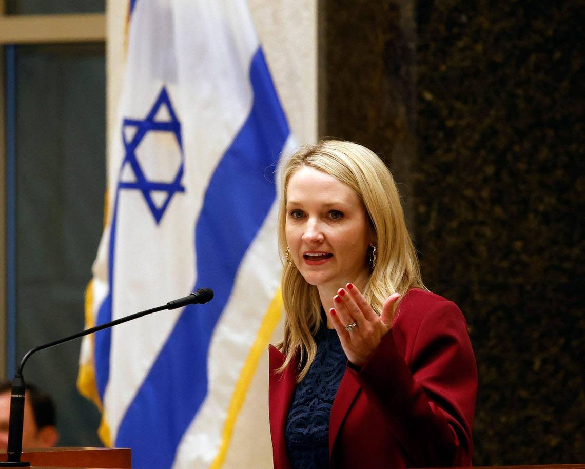 Fort Worth Mayor Mattie Parker gestures to city council members during a vigil for Israel at Beth-El Congregation in Fort Worth, Texas, Tuesday, Oct. 10, 2023. Mayor Parker got a standing ovation when she told the congregation that Fort Worth stood with Israel. 